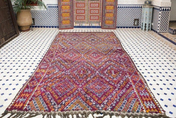 vintage moroccan rug from Beni mguild, berber handmade area rug - sustainably made MOMO NEW YORK sustainable clothing, slow fashion